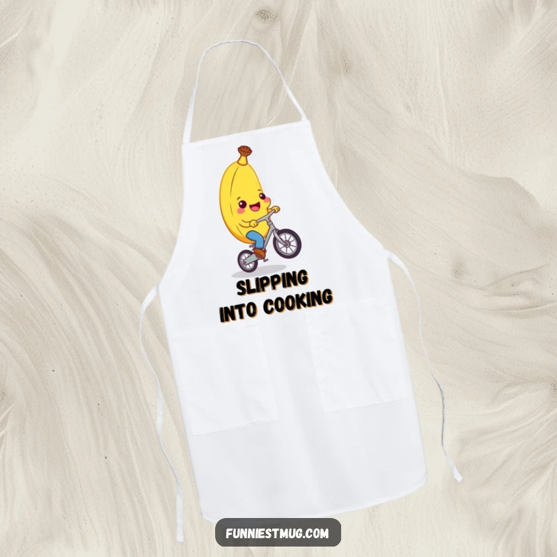 Funny banana character in a chef's hat riding a unicycle on an apron, designed for humorous kitchen adventures and funny gifts.