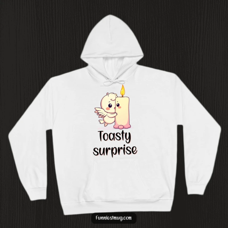 Funny hoodie depicting a playful winged character gently bumping into a giant birthday candle, looking adorably surprised.