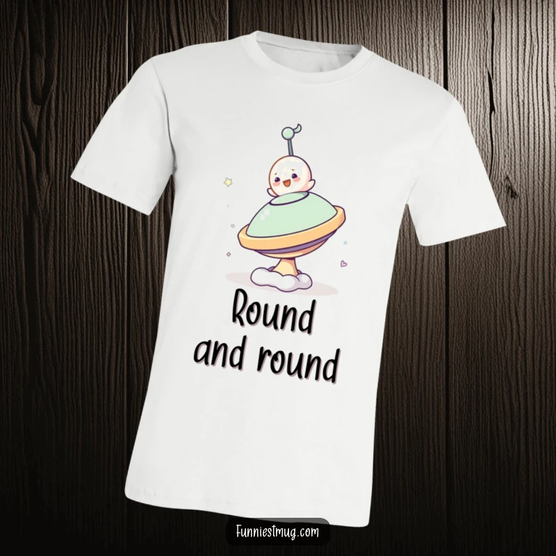 Funny Small Blob T-Shirt capturing the character's hilarious attempt to stay balanced on a large, spinning top, full of motion.