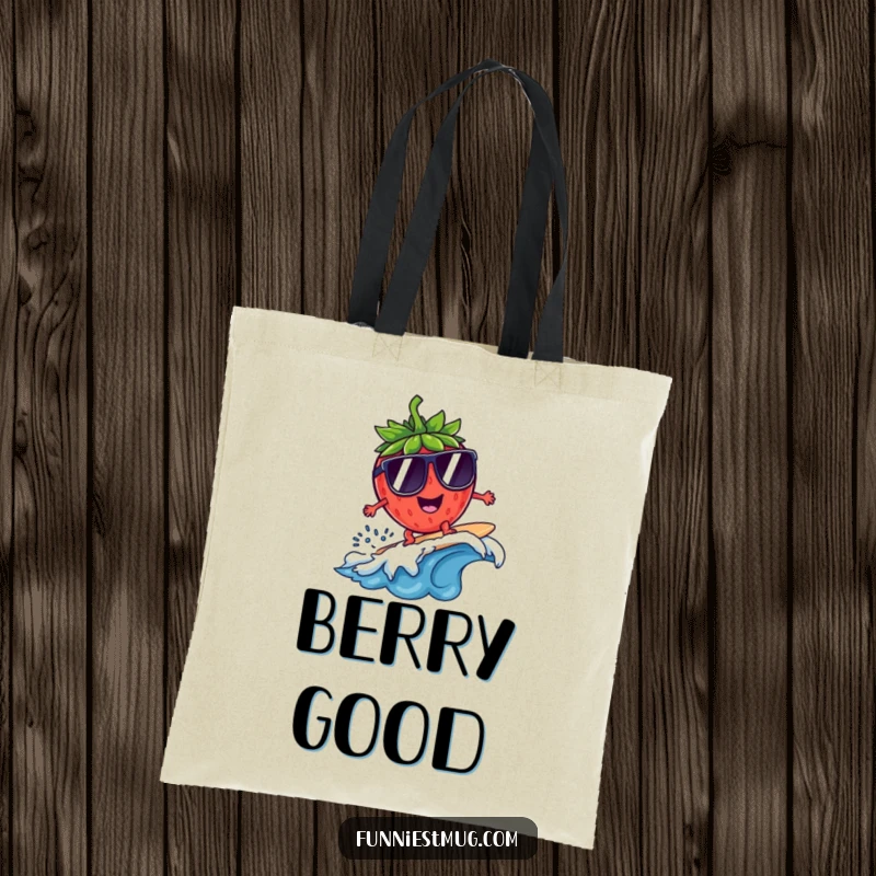 Funny Surfing Strawberry Sunglasses Tote Bag: A strawberry surfs on a tiny wave wearing oversized sunglasses, a very funny accessory.