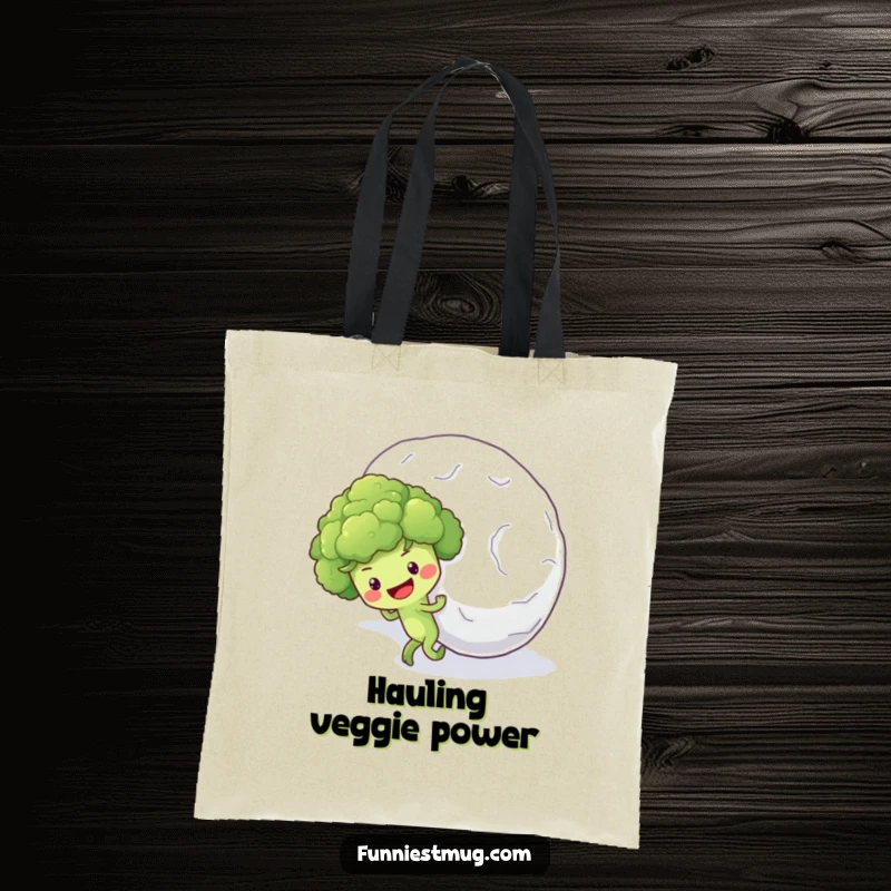 Funny tote bag illustration of a hopeful broccoli floret character pushing an enormous snowball uphill with all its might.